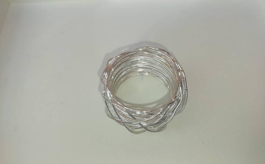 A NEWBRIDGE SILVER WARE SET OF 6 NAPKIN RINGS SOLD AS IS