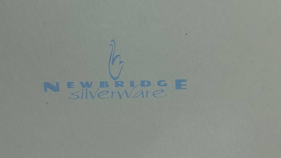 A NEWBRIDGE SILVER WARE SET OF 6 NAPKIN RINGS SOLD AS IS