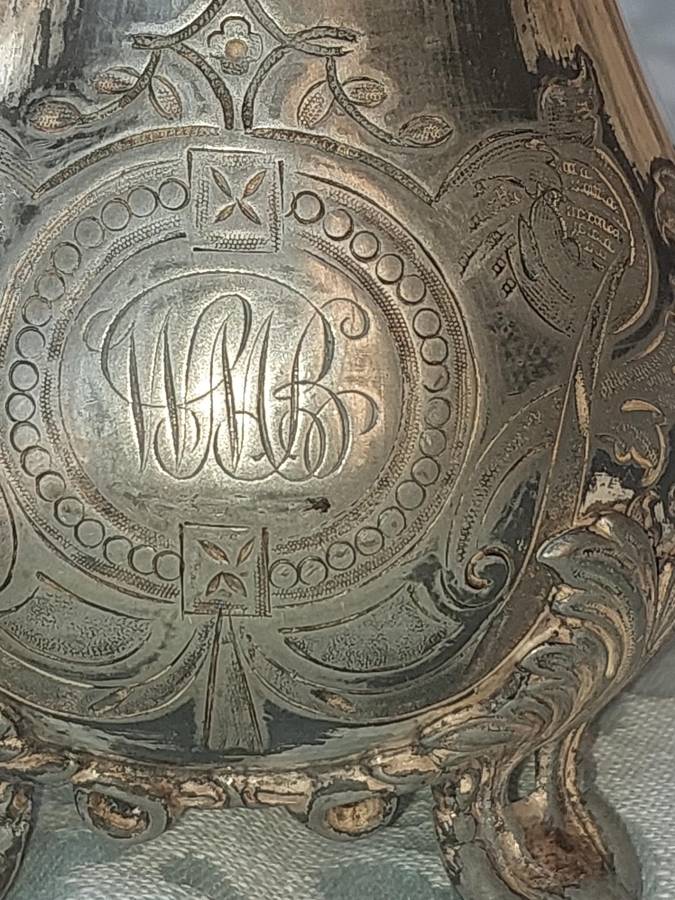 AN ANTIQUE DICKSON AND SONS SHEFFIELD ENGRAVED JUG SOLD AS IS