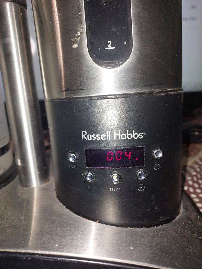 A RUSSEL HOBBS COFFEE MAKER IN WORKING CONDITION SOLD AS IS