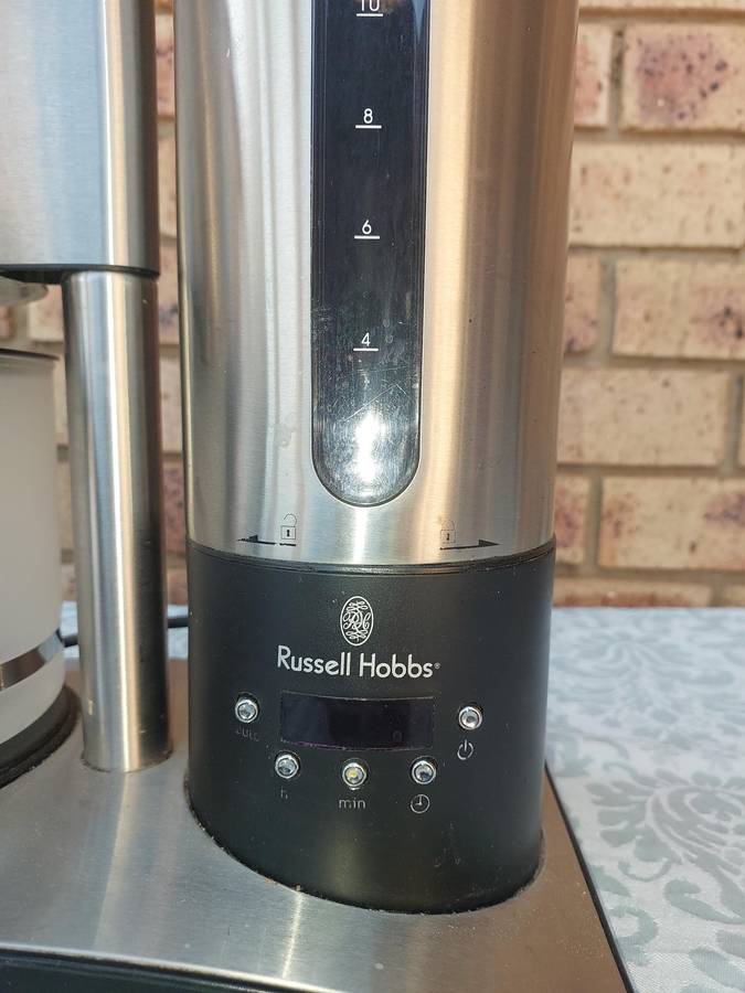 A RUSSEL HOBBS COFFEE MAKER IN WORKING CONDITION SOLD AS IS