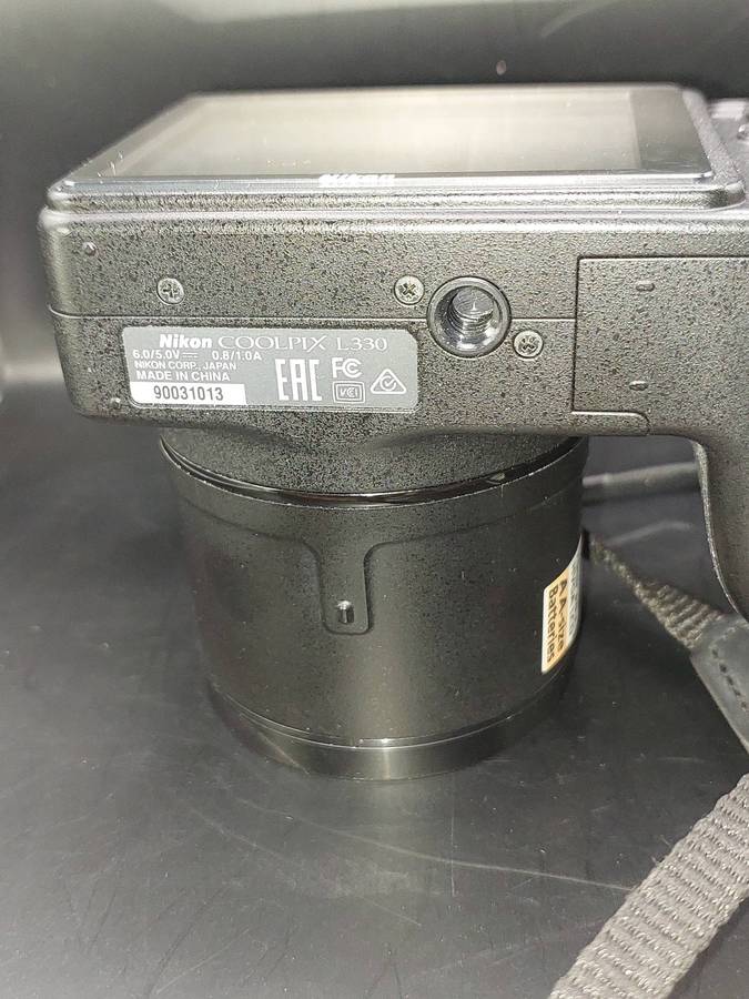 A NIKON COOLPIX L330 CAMERA SOLD AS IS, WORKING, NOT TESTED