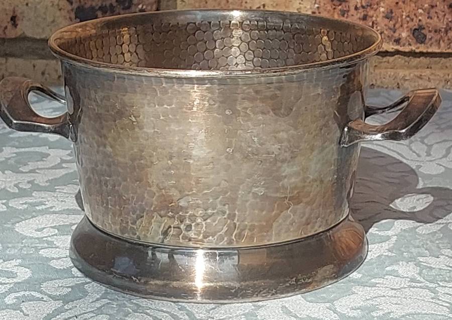 A VINTAGE ICE BUCKET SOLD AS IS