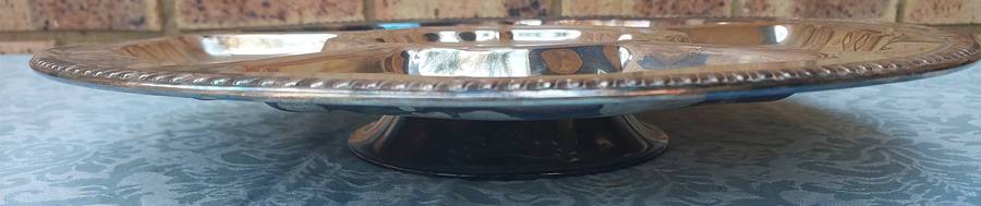 A LARGE SILVER PLATED LAZYSUZAN TYPE SERVING TRAY SOLD AS IS