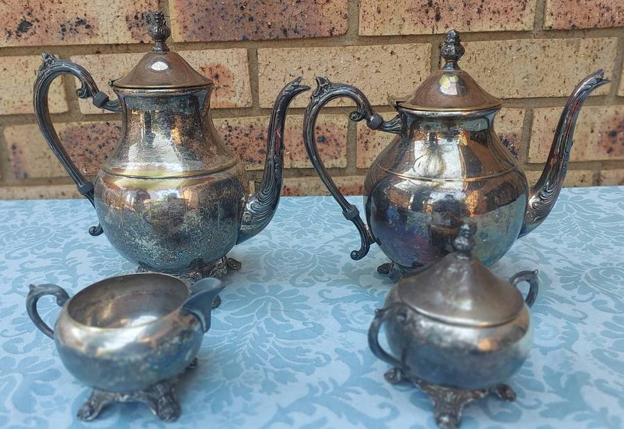A VINTAGE EDWARDIAN FB ROGERS SILVER CO TEAPOT SET SOLD AS IS