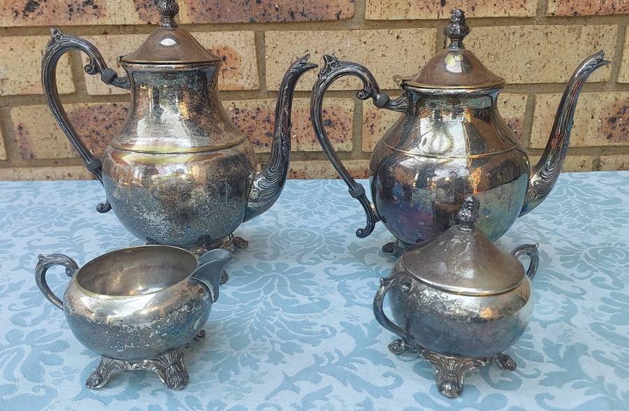 A VINTAGE EDWARDIAN FB ROGERS SILVER CO TEAPOT SET SOLD AS IS