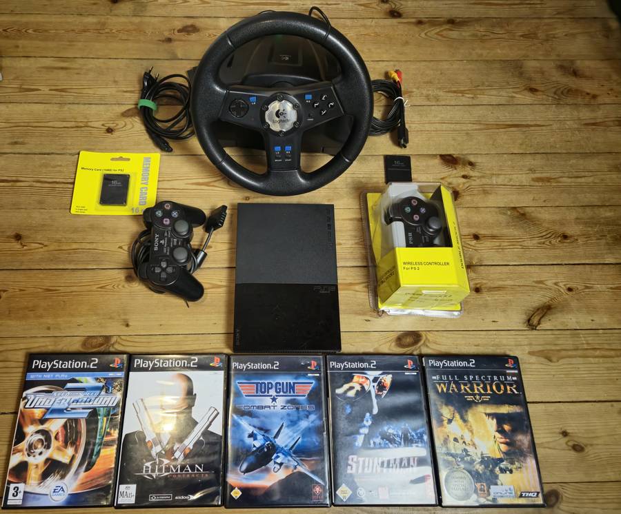 PlayStation 2 Slim Bundle with Logitech Racing Wheel, Controllers, Memory Cards & Games