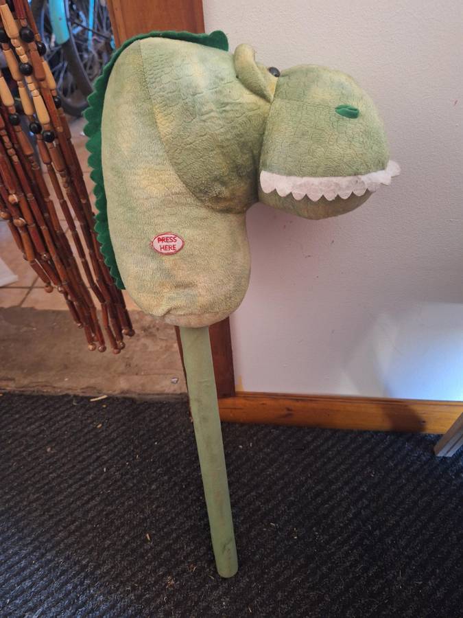 Dinosaur ride-on stick
