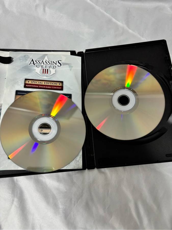 PC DVD ROM Assassins Creed Two Games Revelations, Creed 3 both special editions two disks each
