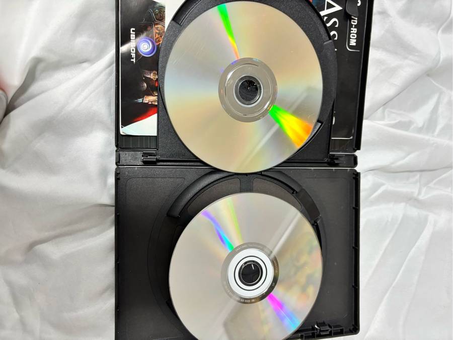 PC DVD ROM Assassins Creed Two Games Revelations, Creed 3 both special editions two disks each