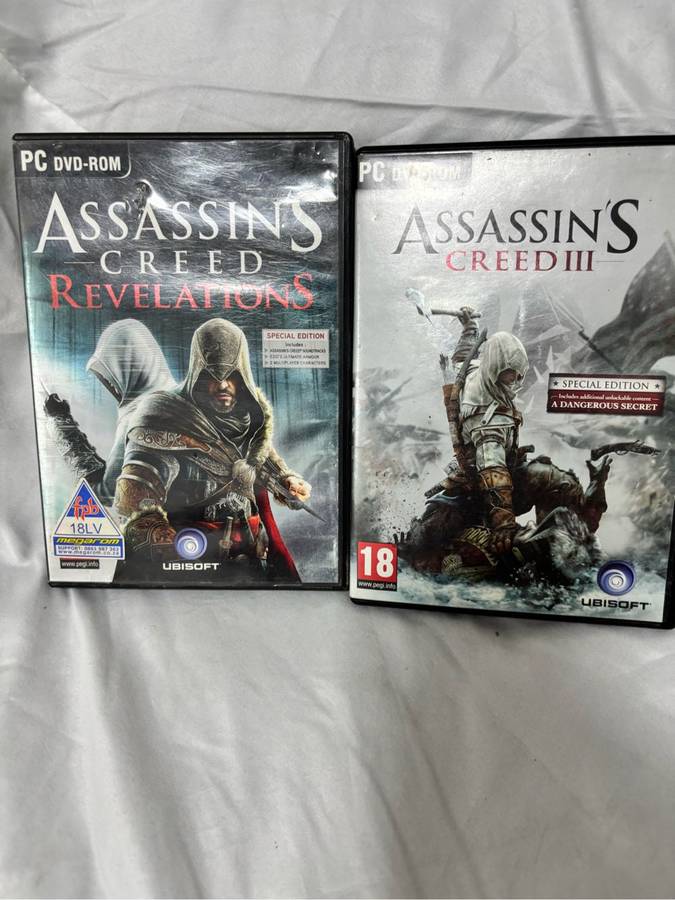 PC DVD ROM Assassins Creed Two Games Revelations, Creed 3 both special editions two disks each