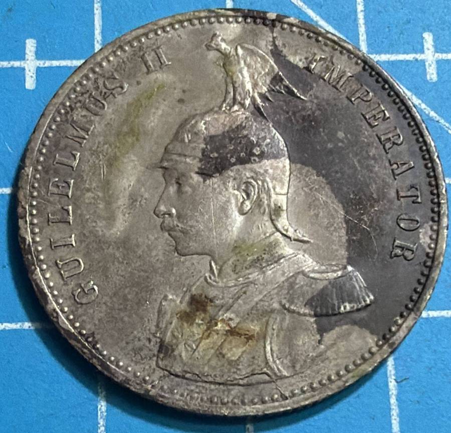 Nyasaland trench art coin on an east africa rupie