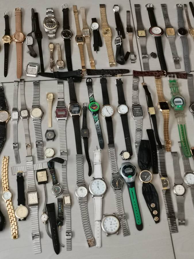 Ex watchmakers uncollected stock 130 watches