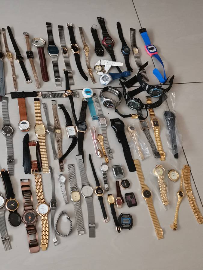 Ex watchmakers uncollected stock 130 watches