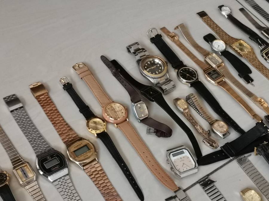 Ex watchmakers uncollected stock 130 watches