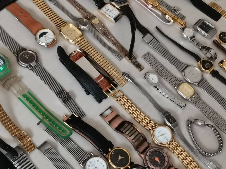Ex watchmakers uncollected stock 130 watches