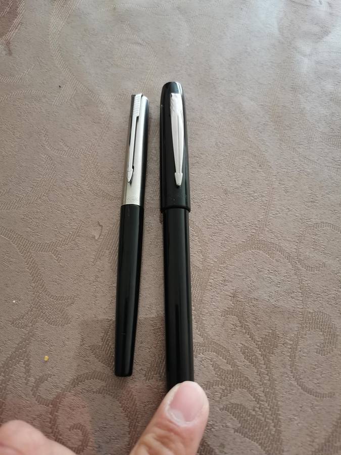 2 parker fountain pens with small defects
