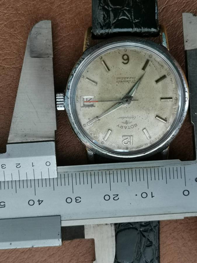 Vintage rotary calendar 21 jewels incabloc manual wind watch