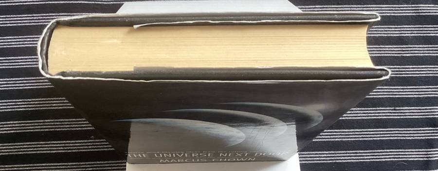 The Universe Next Door, by Marcus Chown. Hardcover, V Good condition.