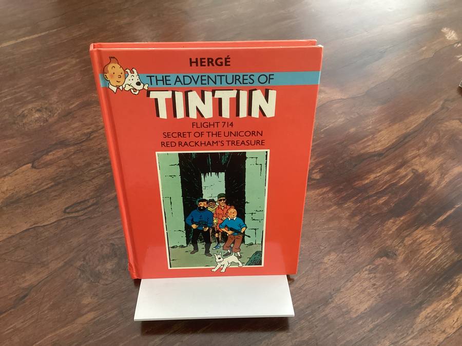 The Adventures of TINTIN (3 titles in one hardcover book). Excellent clean and fresh condition.
