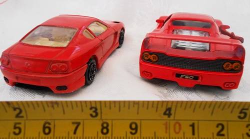Burago red Ferrari456 GT 1:43 scale and Maisto Red Ferrari F50 1:39 two die-cast models