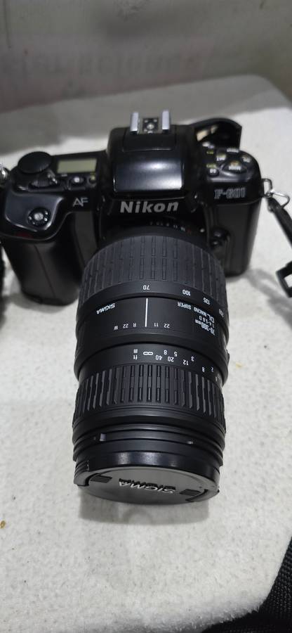 NIKON F601 CAMERA WITH LENS ,CASE AND A SPARE FILM ROLL