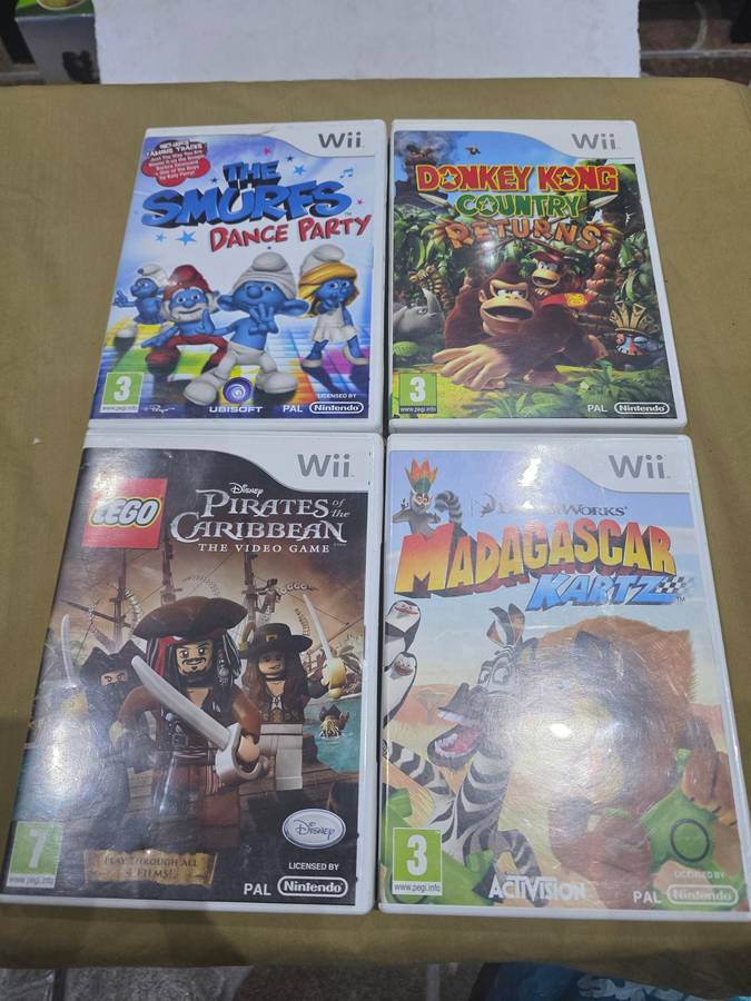 NINTENDO WII CONSOLE INCL.POWER SUPPLY, REMOTE ,8 GAME DISCS & ASSESCORIES