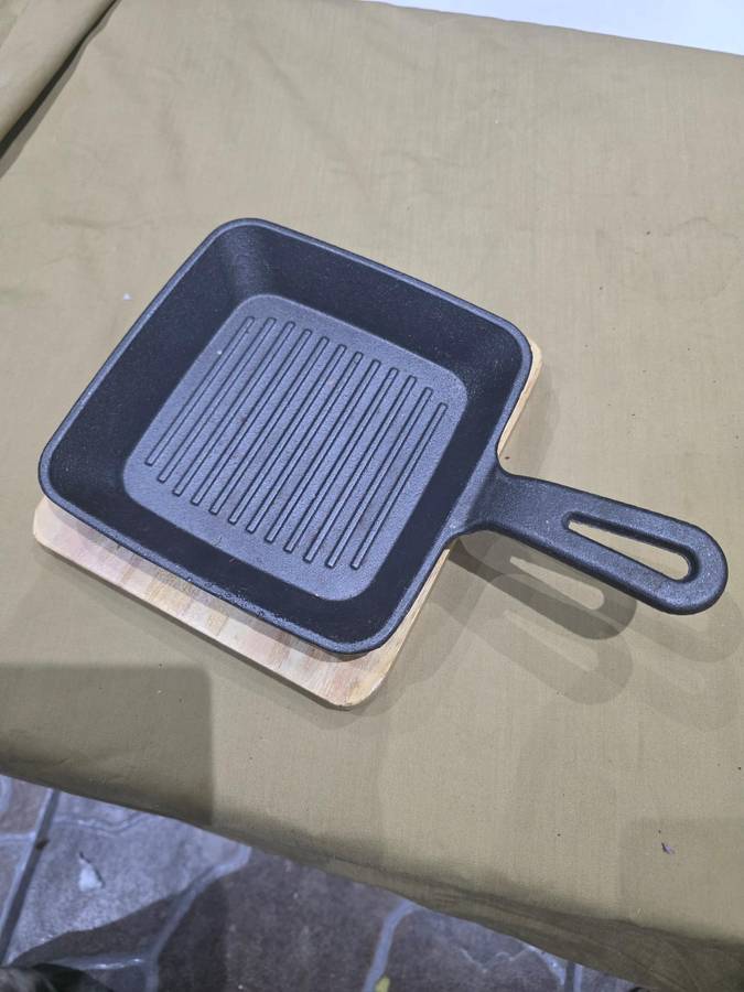 CAST IRON GRIDDLE PAN ON BOARD