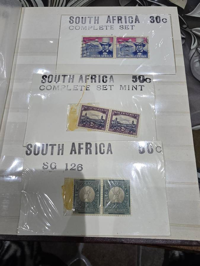 COMPLETE MINT SET OF 9 SA STAMPS PLUS EXTRAS WITH ALBUM