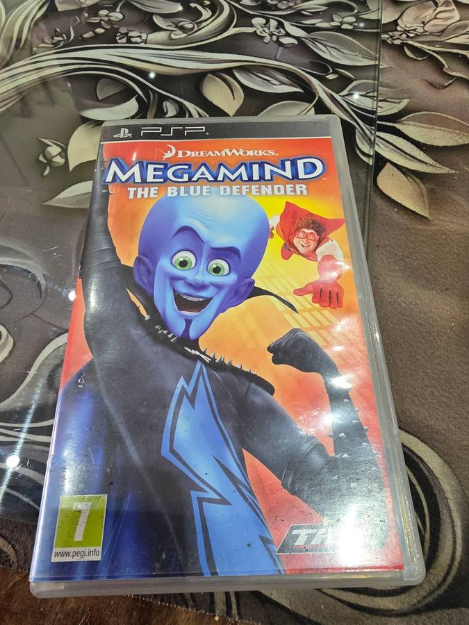 PSP GAME DISC(MEGAMIND)THE BLUE DEFENDER