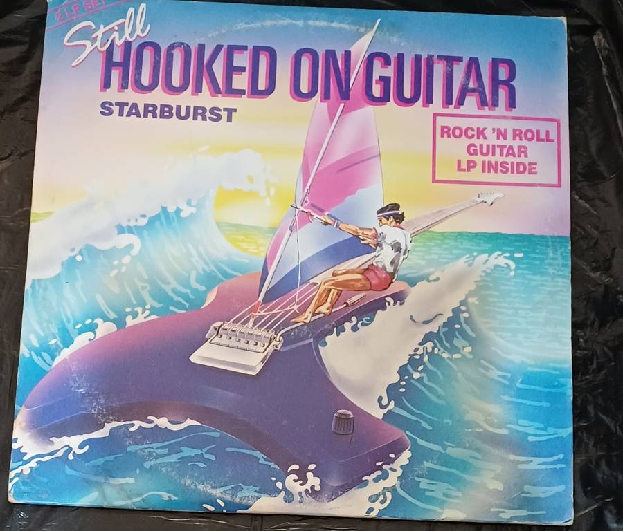 STARBURST - STILL HOOKED ON GUITAR