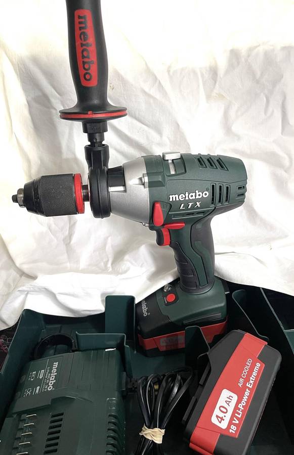 Metabo SB 18 LTX Impulse Cordless Hammer Drill, with batteries case and charger, never used.