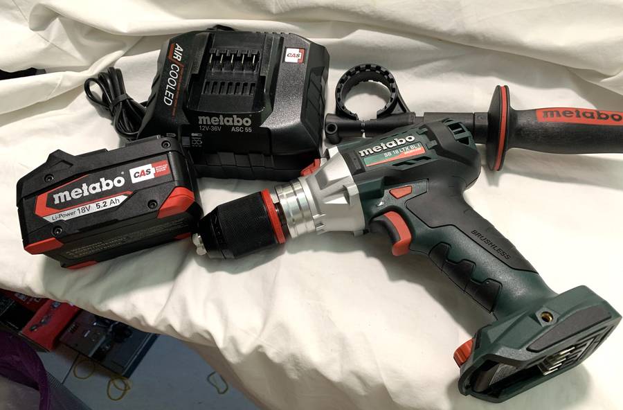 New Metabo 120Nm cordless Hammer Drill with battery and charger.