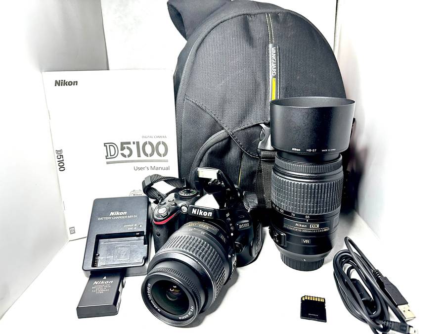 Nikon D5100 with 2x Lens and accessories + Bag
