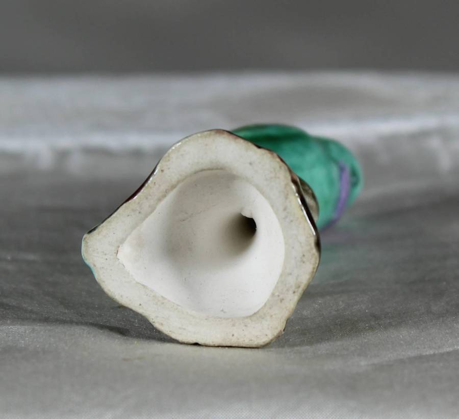 Miniature porcelain green parrot
