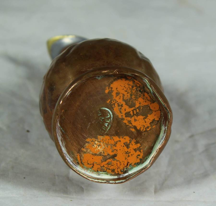 Small hand beaten copper jug