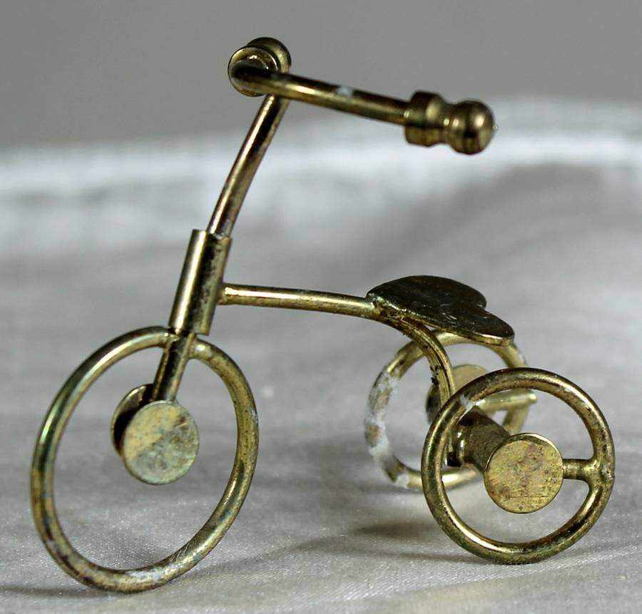 Miniature brass tricycle