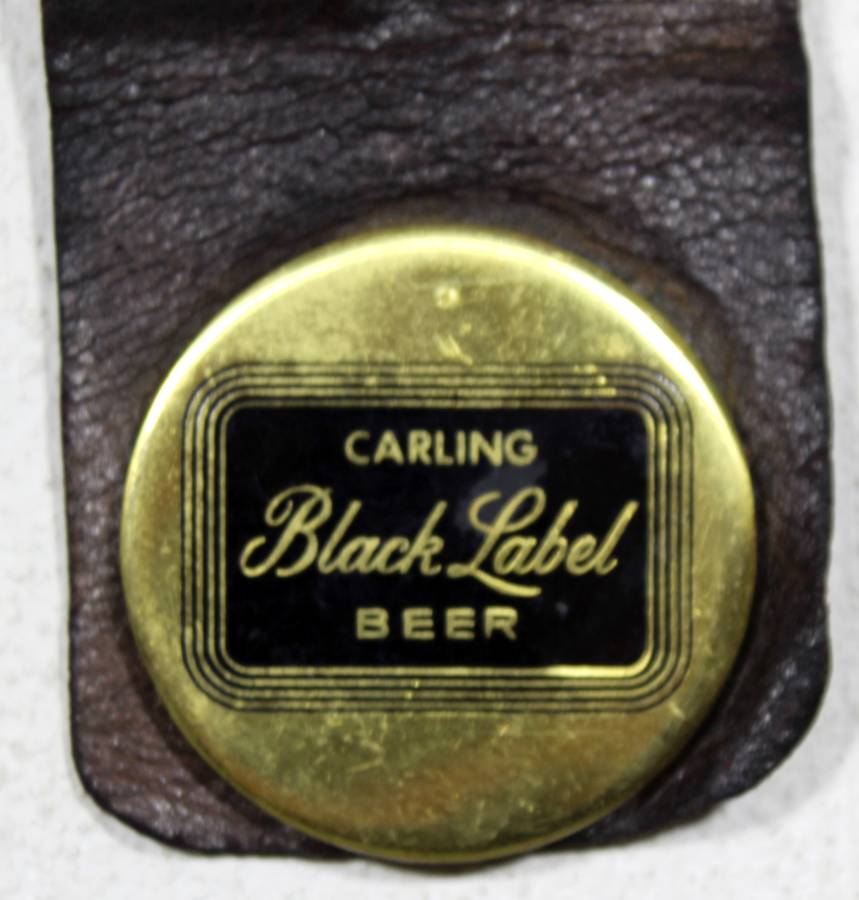 Rhodesian Breweries - Lion, Castel, Black Label brass medallions on leather strap