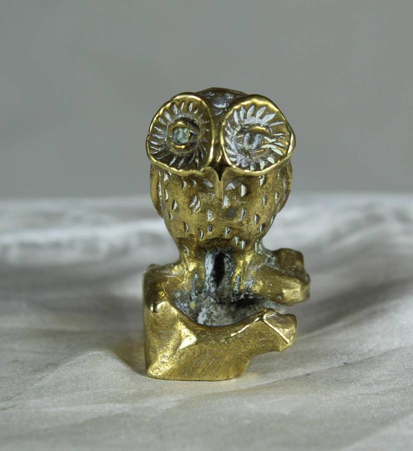Miniature brass owl on a stump