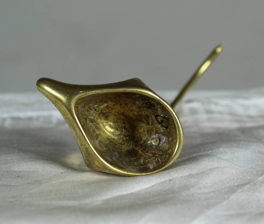 Miniature brass mouse with a brass tail