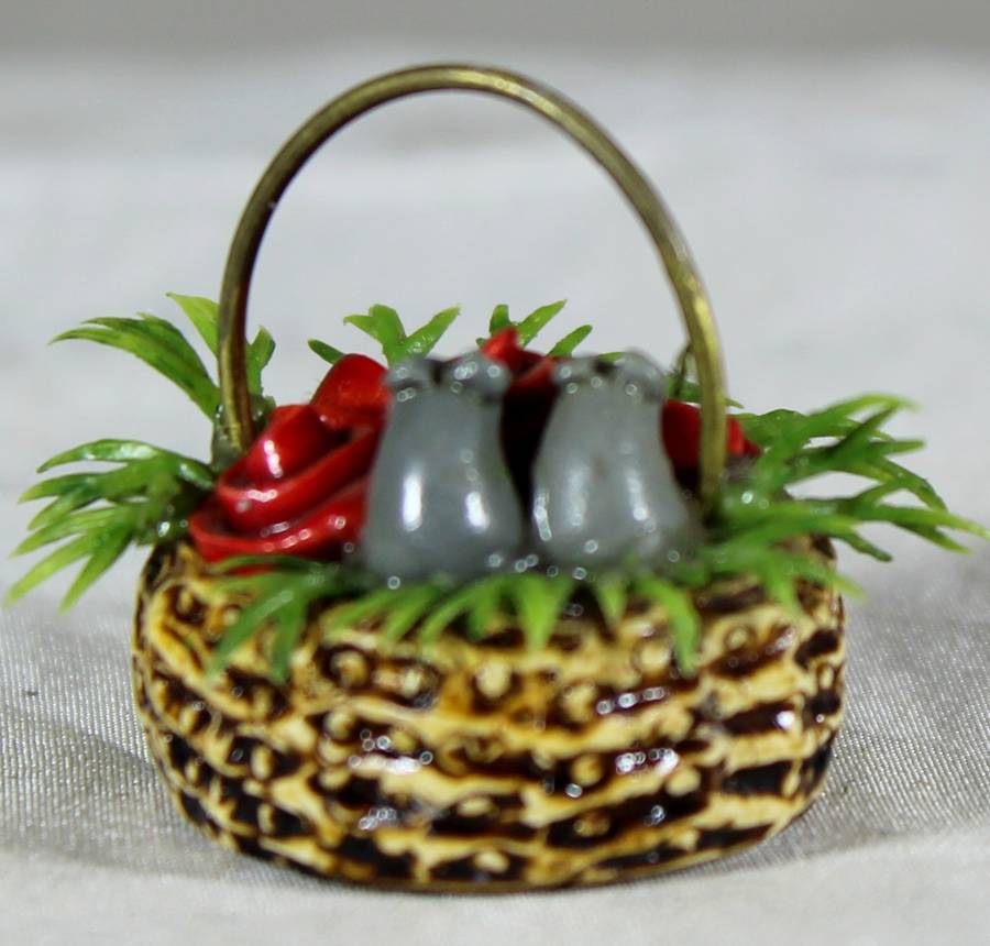 Mini miniature mice on a basket