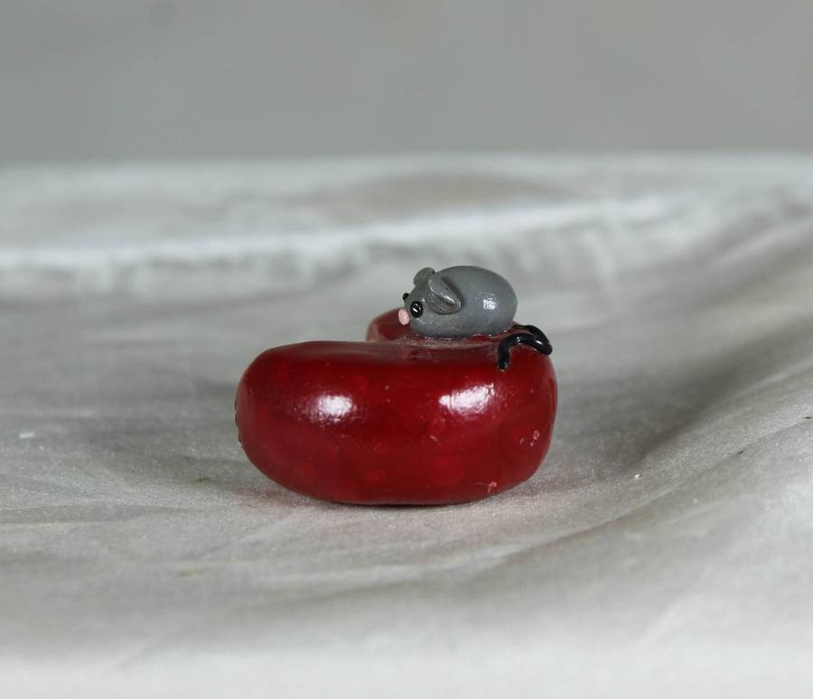 Mini miniature mice in a roll of cheese