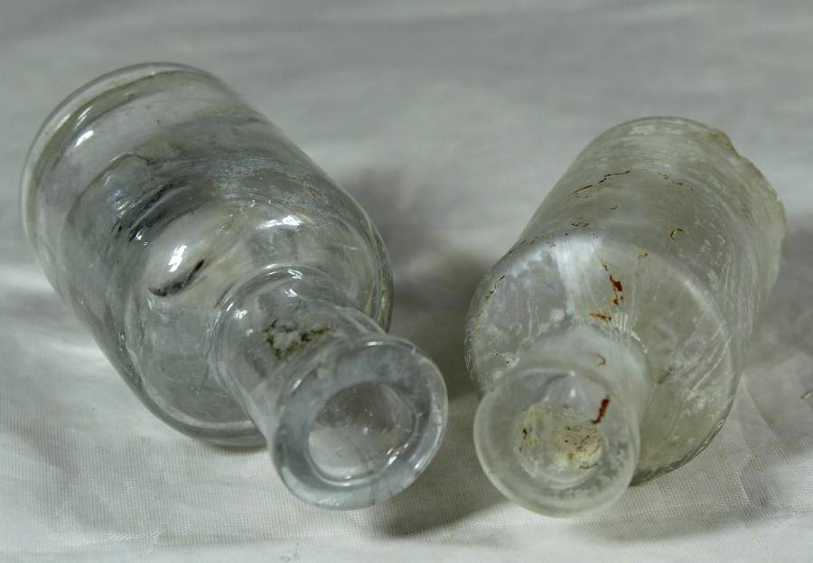 Vintage glass bottle pair
