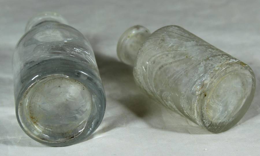 Vintage glass bottle pair