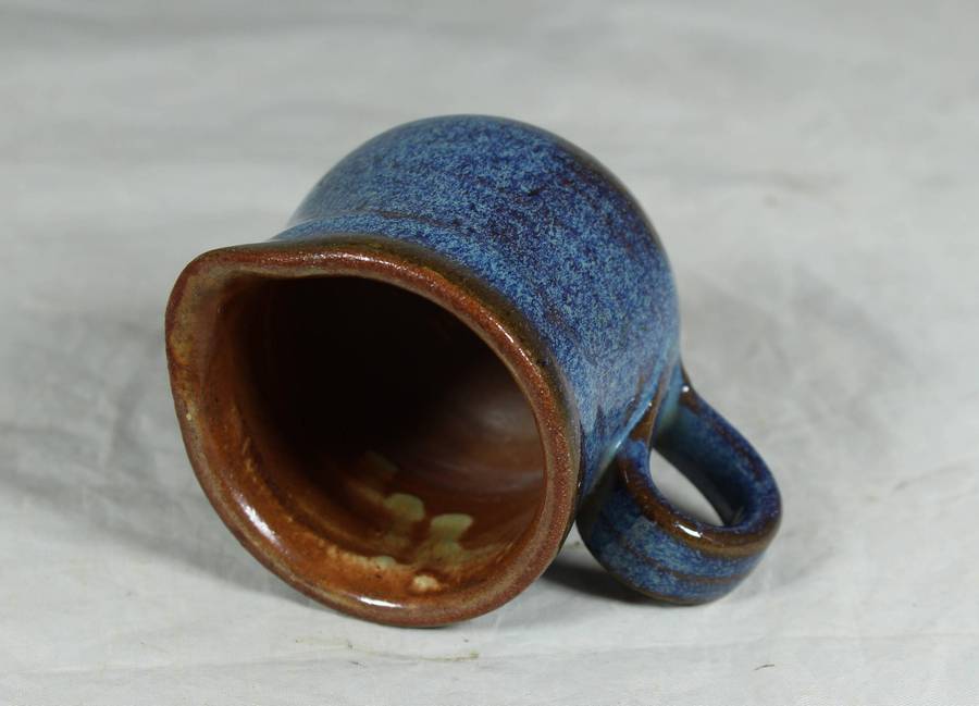 Small pottery milk jug