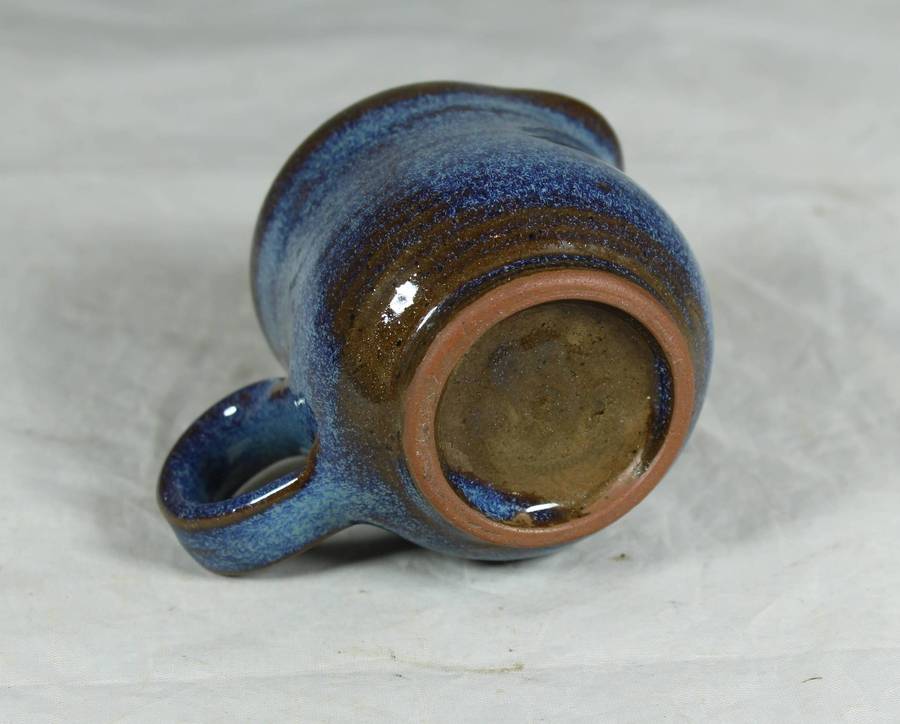 Small pottery milk jug