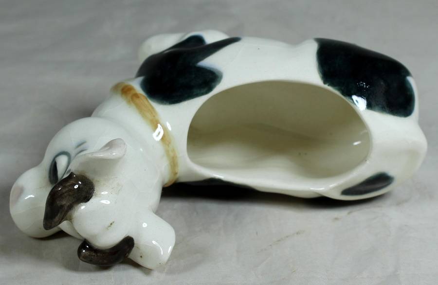 Cow laying down trinket holder
