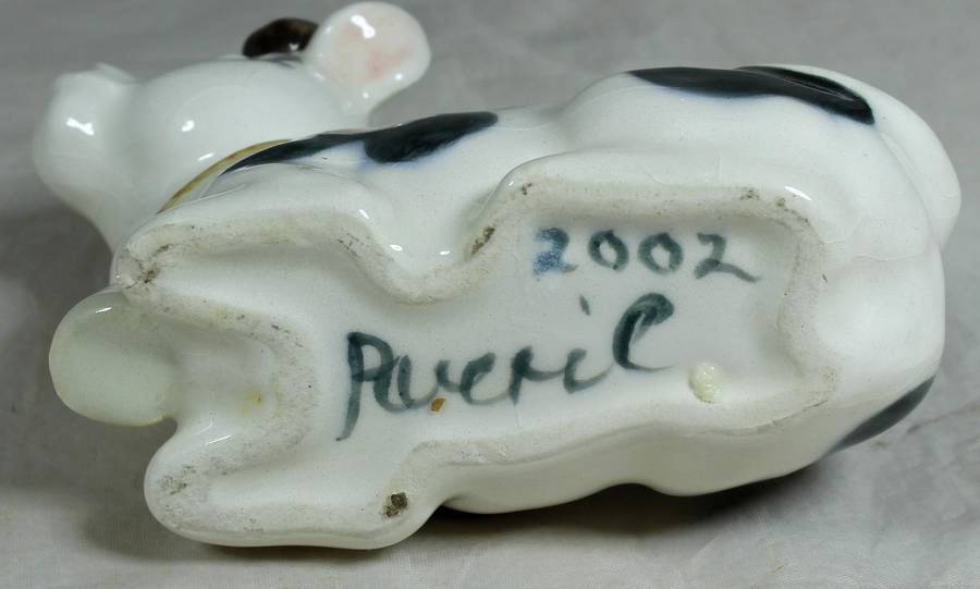 Cow laying down trinket holder