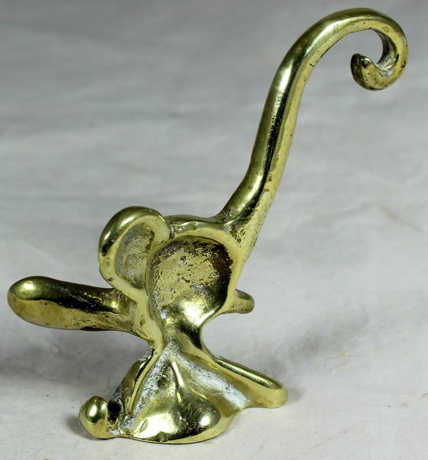 Brass elephant with long trunk