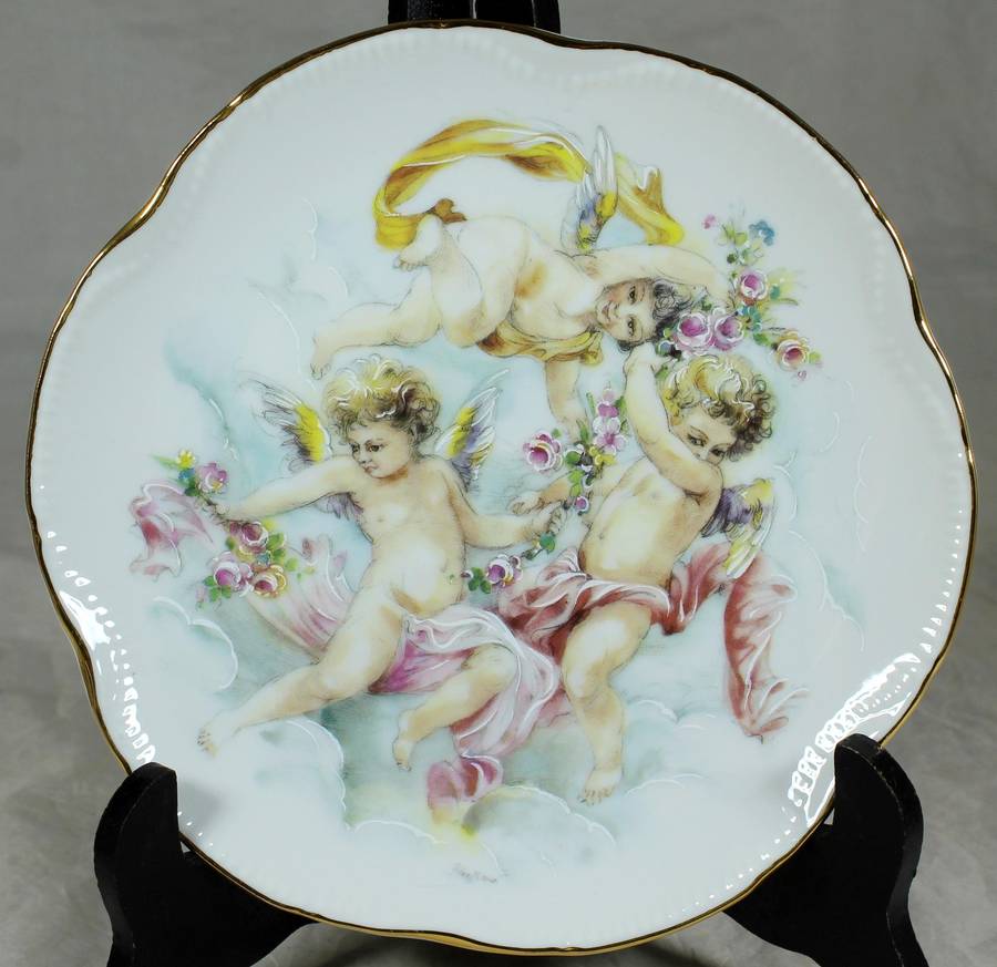 Jones & Middleton, Burslem - three cherubs with roses